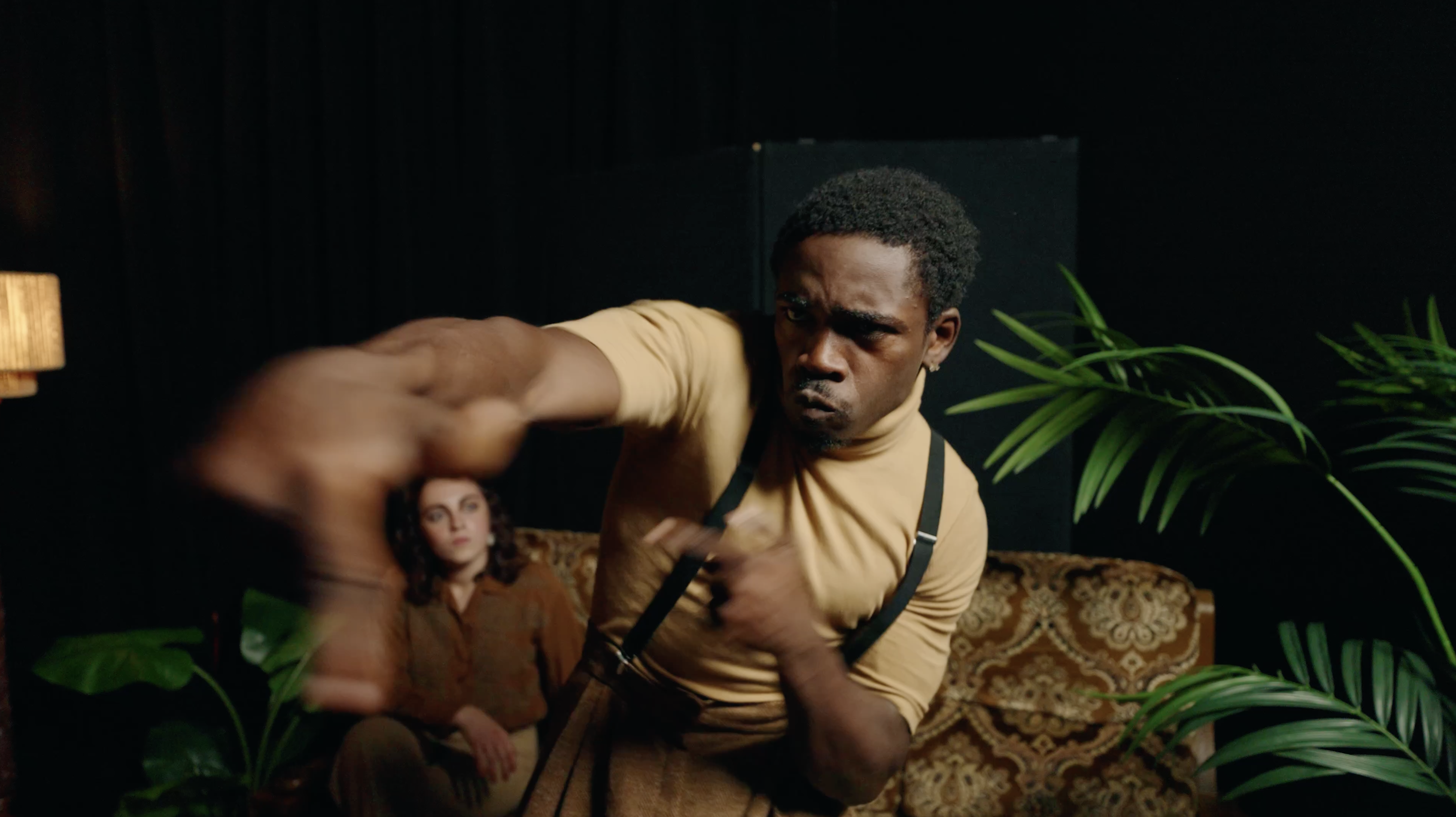 Fleur De Decker and Carla Parcianello seated in orange chairs