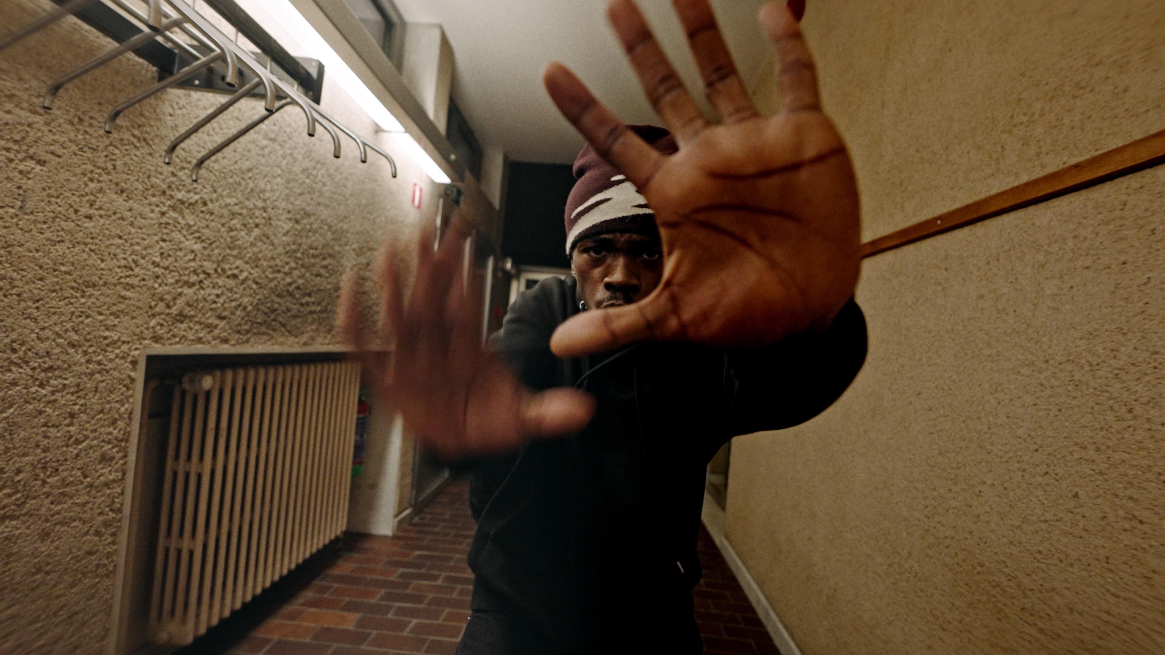Manu interacting with the camera through dance.